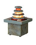 Kamenná fontána Masao s tekoucí vodou a osvětlením